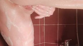Having fun in the shower with a soapy finger fuck