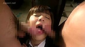 A vibrator is inserted and fitted into her mouth and bukkake is then done on her face.