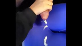 Slow-mo wad drips down curves while she's wrapped in electric blue spandex