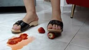 crush in wooden Berkemann sandal and barefeet some fruits *crushing and stomp some fruits*