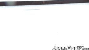 Japanese teen urinates heavily soaking the floor