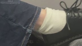 Amelie has an itchy foot on the busy train