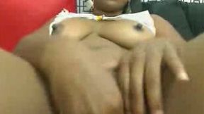 Ebony BBW webcam chick from Jamaica fingers her wet poontang