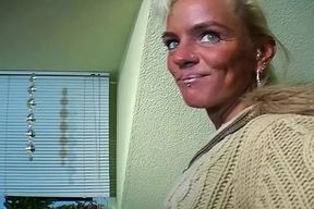Slim and old German blonde loves stuffing her dildo deep inside