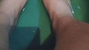 Playing with my feet in the water