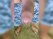 Twitching cock drips cum on the ground - slow motion