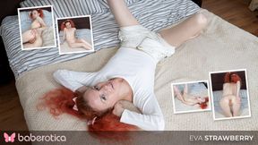 Cute and sexy Russian redhead Eva Strawberry fingers her pussy while moaning loudly