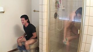 Fellow was sitting on the chair and became very lusty watching the girl in the shower