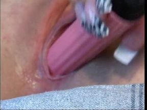 Blonde slut plays with vibrator and smokes a cigarette