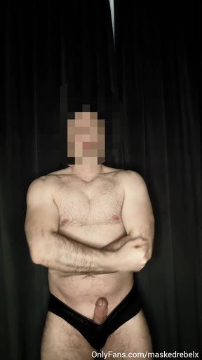 Hot guy stroking his thick cock on the couch