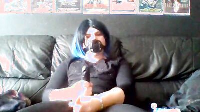 Masked femboy strokes his toy in front of the camera