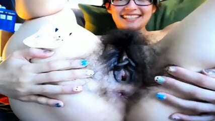Hot babe playing with her hairy pussy