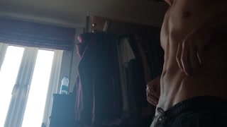 Sexy male stripteases, hip thrusts and shakes with pleasure