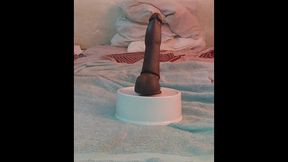 nelsy bounces on a dildo that stands in for her beloved ronny—who is away on a trip—but the urge to feel a huge cock inside her proves too strong; thinking of her man, she releases all her juices.