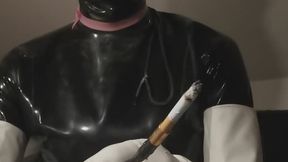 Smoking Kitty kat wearing white glovez