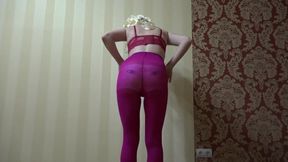 A pregnant woman in pantyhose showcases her curves while pleasuring herself doggystyle.