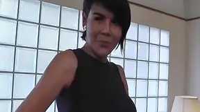Short-haired Ladyboy In Black Dress Strips On So