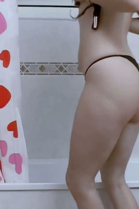 Calia-b: Sexy Blonde Teen Making a Strip in the Bathroom