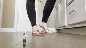 Giantess Dominates Tiny Man Under Her Feet