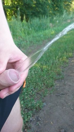 Guy Pissing in Nature