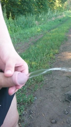 Guy Pissing in Nature