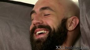 Bearded bald hunk with big dick gets sucked