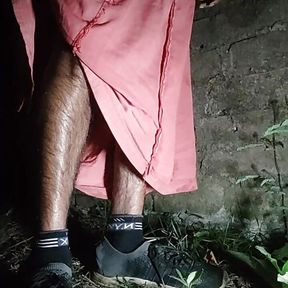 a desi boy exploring the world of sex toys in an outdoor setting at night. The boy will be discussing and demonstrating various