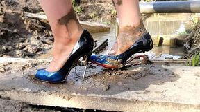 High heels full destruction, ruined high heels, broken high heels, high heels in mud, wrecked high heels, muddy feet, ripping muddy stockings, high heels stuck, high heels sinking in mud, high heels destruction