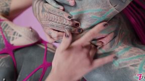 tattooed babe goes hard with the strap until the inked slut squirts