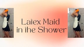 The Latex maid can't stand the heat so she takes a shower in latex to cool off