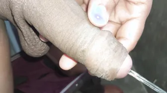 Indian stud strokes his thick black cock in solo handjob show