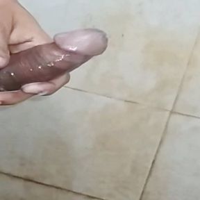 A young horny boy moan and huge cum before taking bath