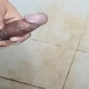 A young horny boy moan and huge cum before taking bath