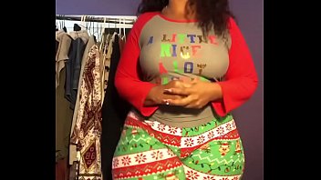 Cherokee D Ass stretching in Christmas leggings