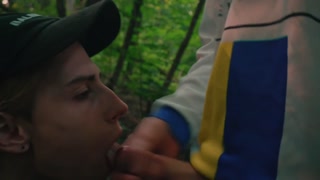 Two friends decided to have fun outdoors after a picnic.