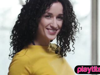 Slim European gal undresses and discloses her merry bazookas and curly lil twat