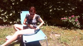 italian girl sunbathing in a public garden with a big dirty diaper