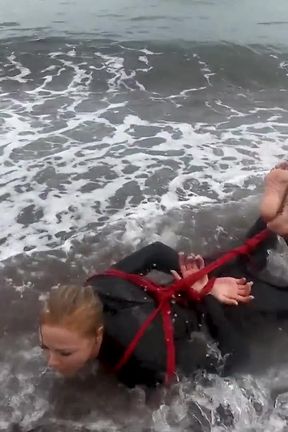 Hogtied in a Wetsuit - Rope Bondage Escape Challenge on the Beach