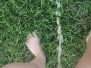 Girl Pees While Walking In Grass
