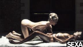 ”Ebony hot hottie & sexy blonde oil each other up for lesbian sex”