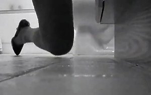 Teen trying out a dildo in the bathroom