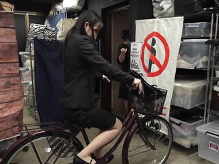 Playing a prank on the bicycle saddle of a gorgeous, large-buttocked office