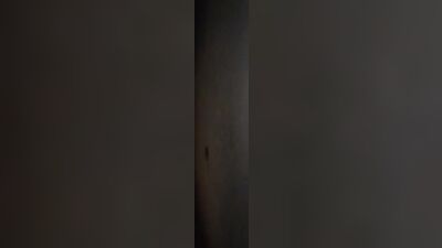 Cock hungry bloke plays with mate's cock through a glory hole
