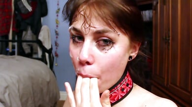 Brunette in red-studded collar deep-throated on wooden floor