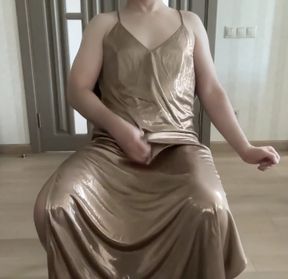 Cuckold sissy trap masturbating in a golden satin silk long maxi dress