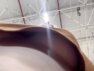 Guy films woman with hidden cell phone masturbating and her tits during the time that this babe shops at the supermarket