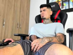 Gay latin stud jerks off his cock until he cums