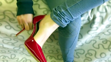 Red stiletto domination with footjobs and shoe-fueled control