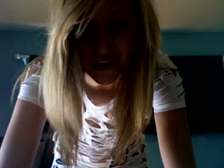 Charming blonde teen takes her clothes off in front of camera
