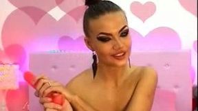 Lewd webcam whore with too heavy makeup played with sex toy